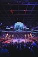 a crowd of people watching a basketball game