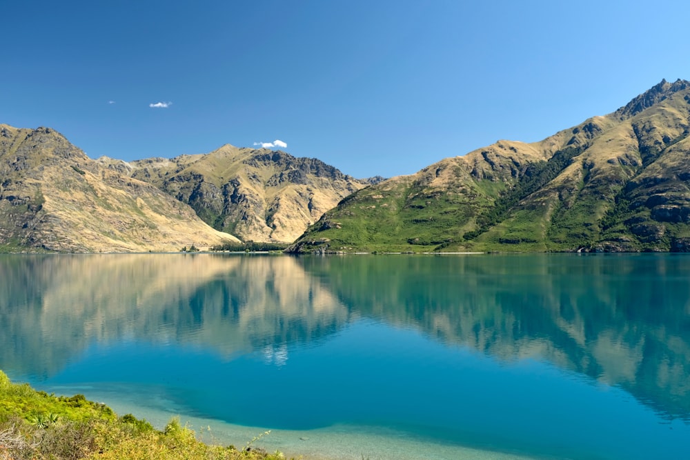 a large body of water surrounded by mountains