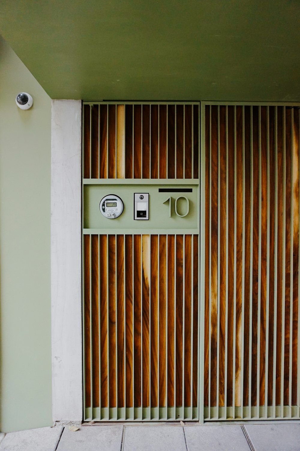 a door that has a clock on the side of it