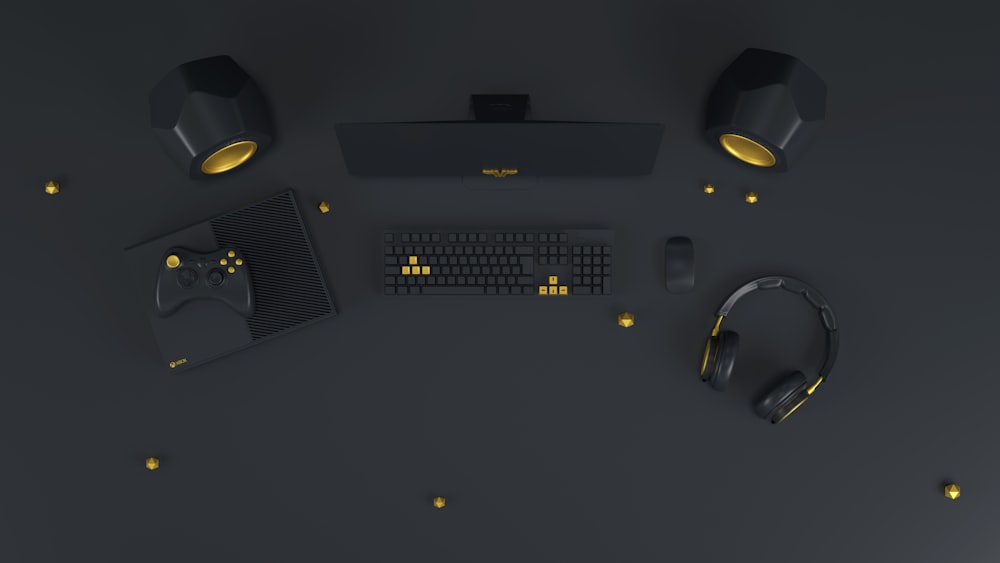 a computer desk with a keyboard, mouse and headphones