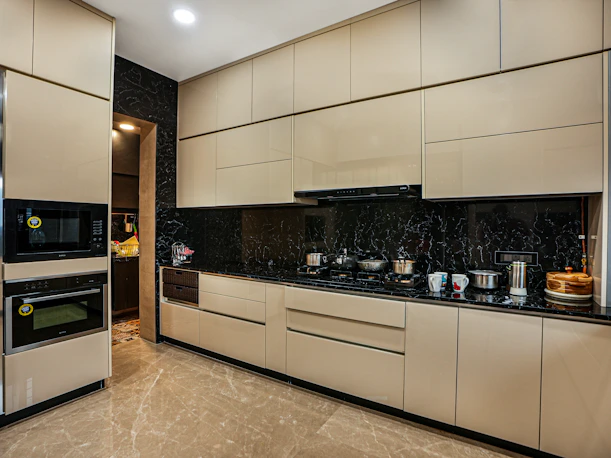 a kitchen with a stove, oven and microwave
