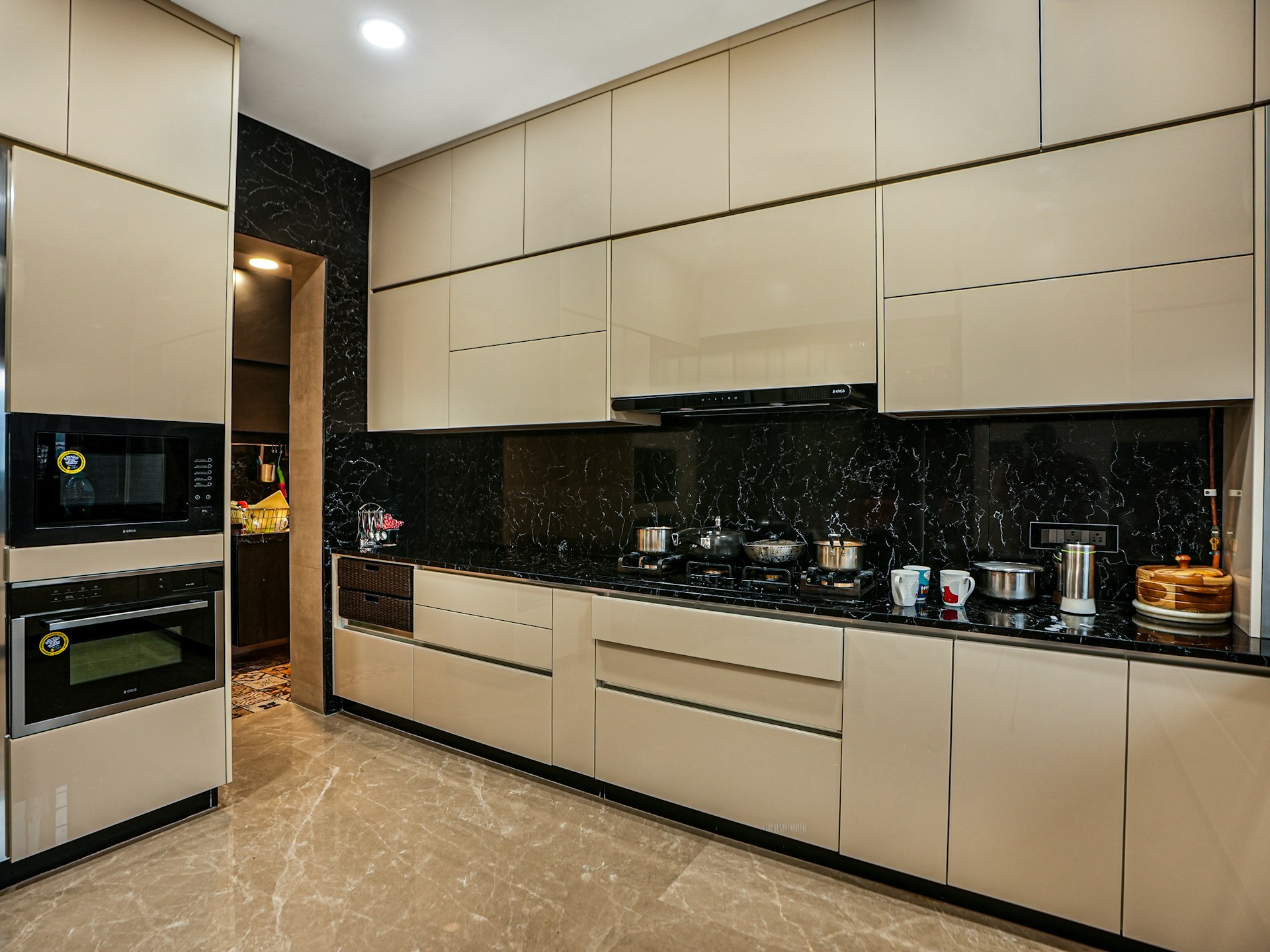 a kitchen with a stove, oven and microwave