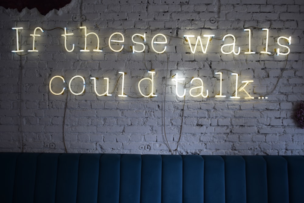 a neon sign that says if these walls could talk