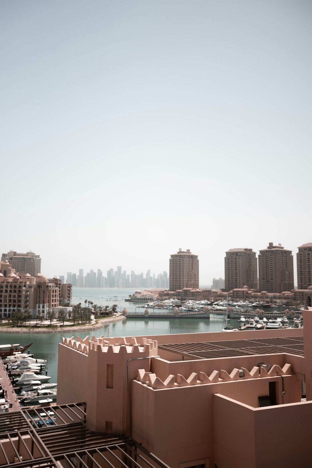 a large body of water with a city in the background