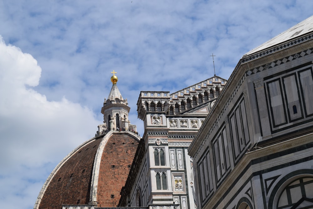 a tall building with a clock on the top of it