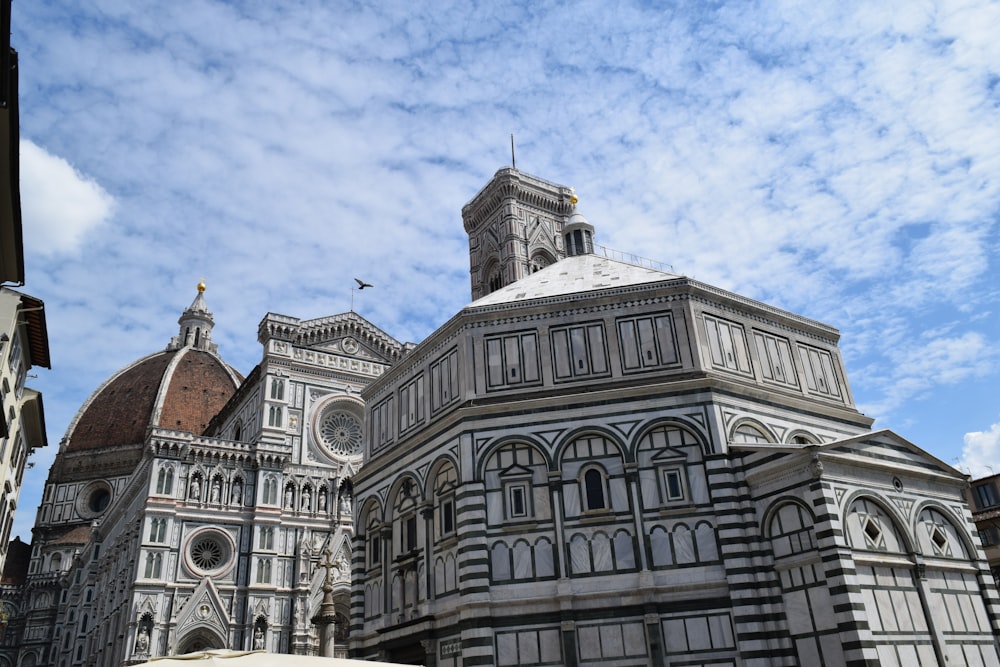 a large building with a clock on the top of it