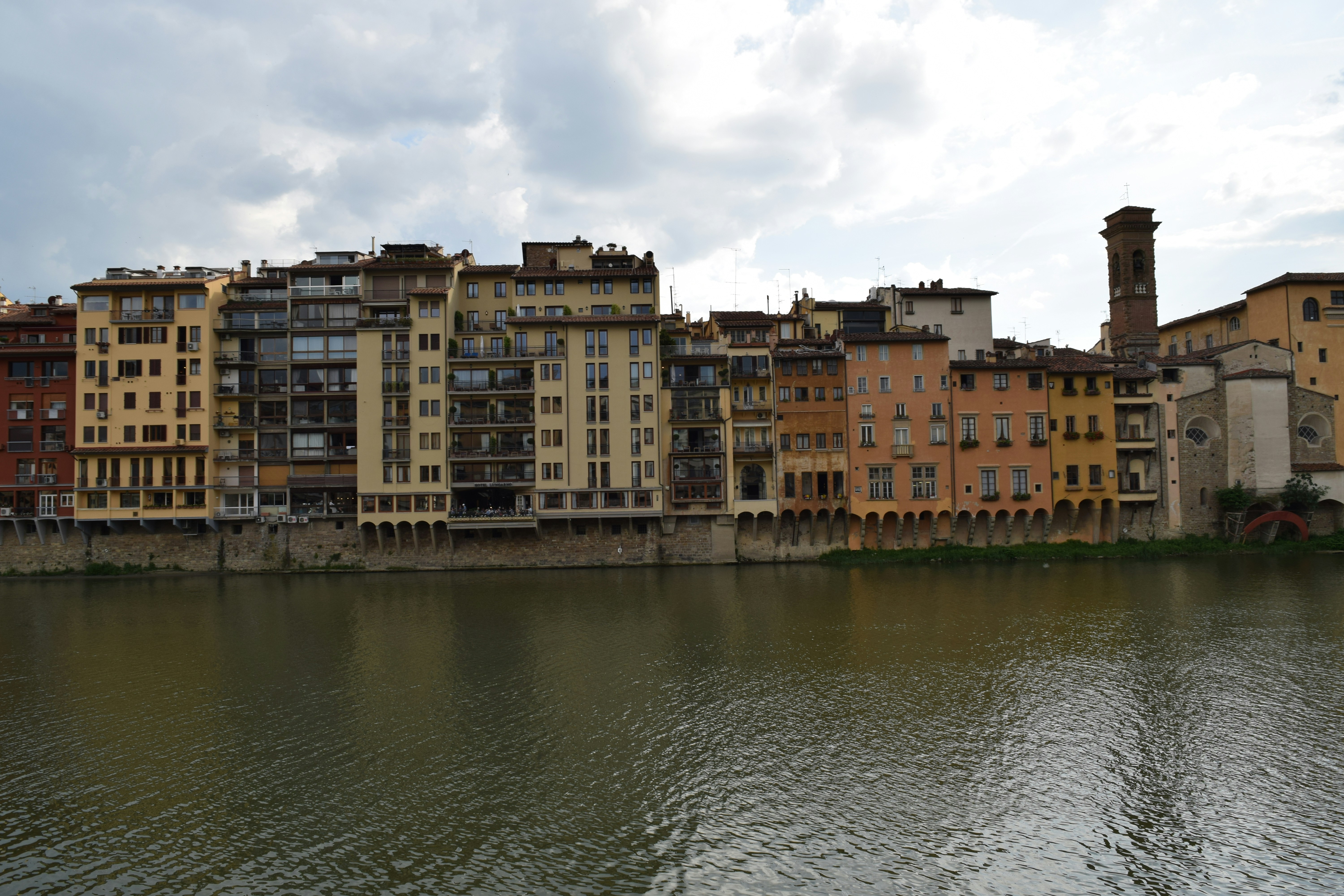 a body of water that has some buildings on it, 