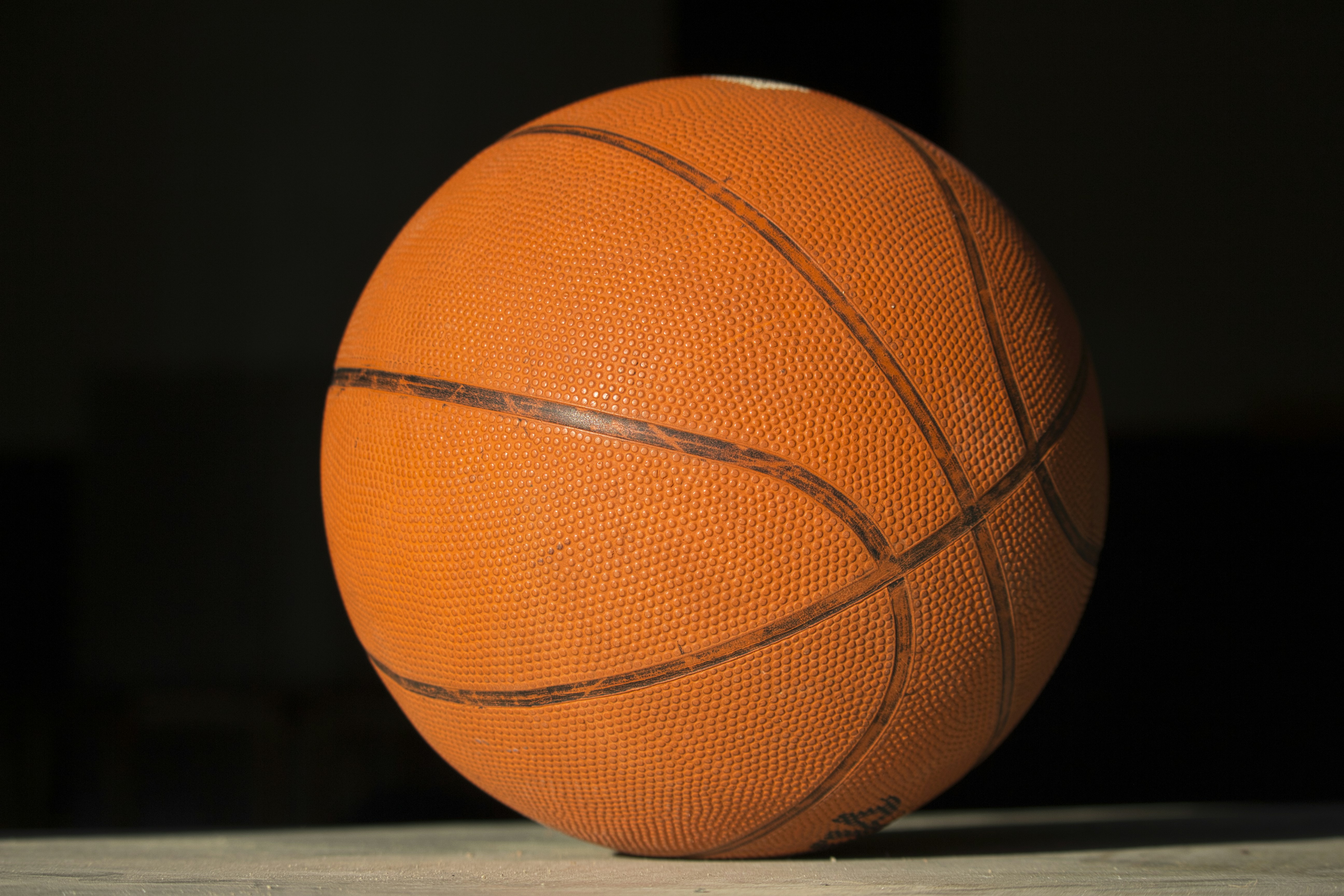 a close up of a basketball on a table