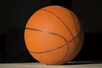 a close up of a basketball on a table