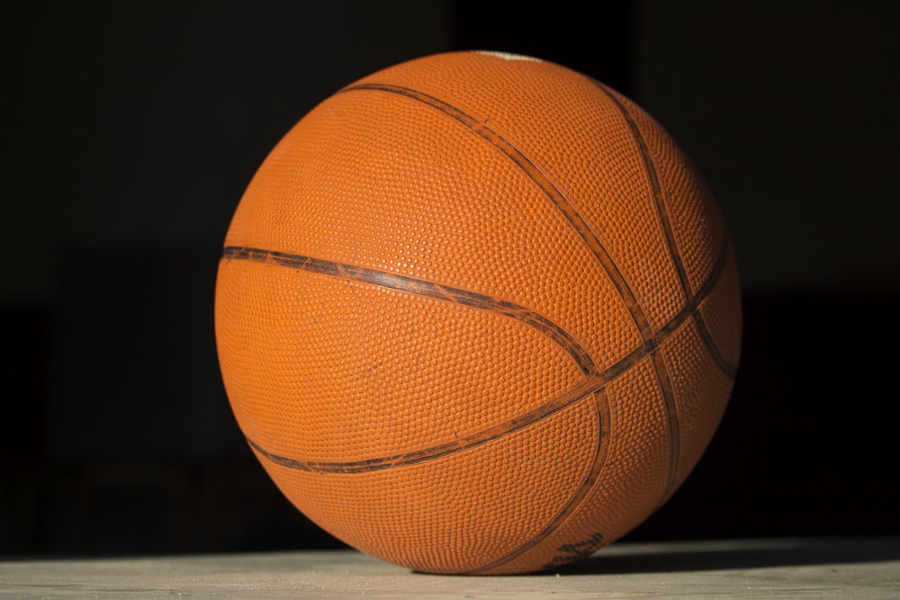 a close up of a basketball on a table