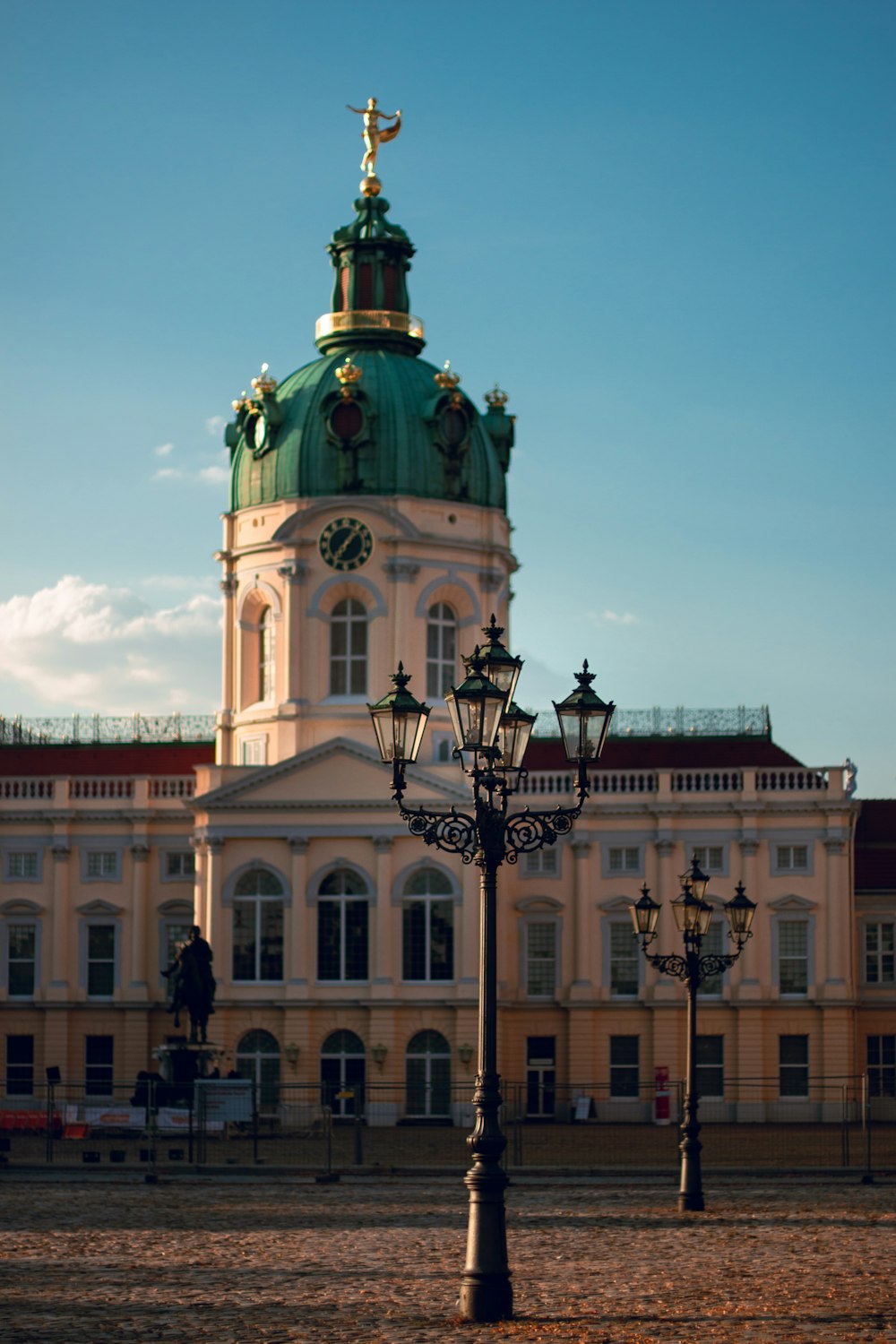 a tall building with a clock on the top of it