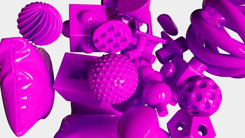 a bunch of purple objects that are in the air