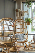 Round woven seagrass side tables accentuating a relaxing lounge area bathed in natural light.