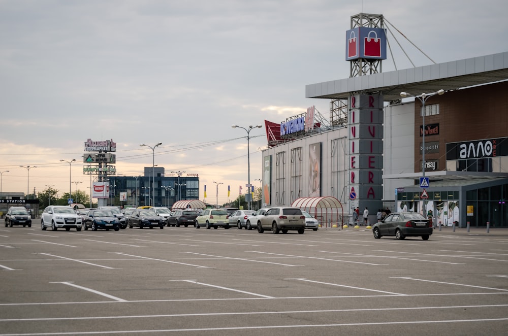 a parking lot filled with lots of parked cars