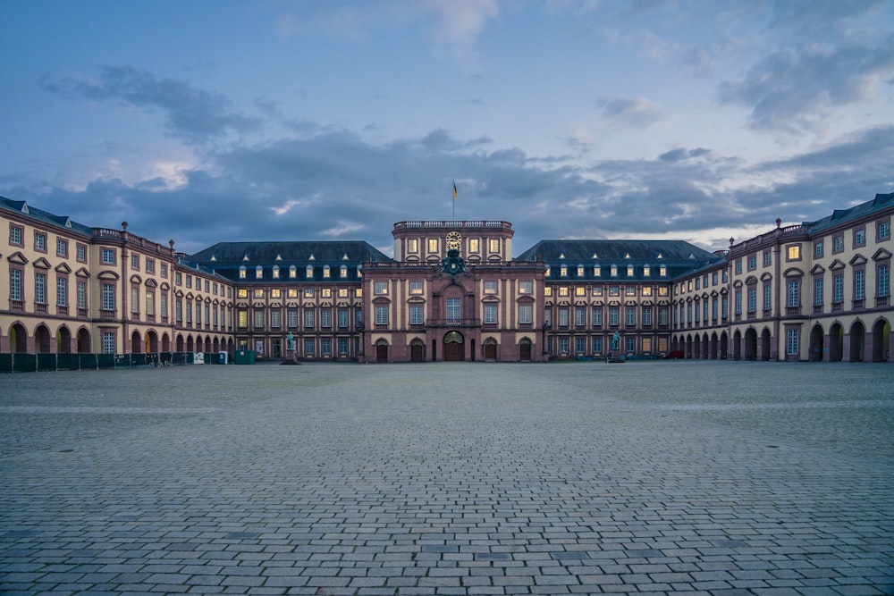 a large building with a clock tower in the middle of it