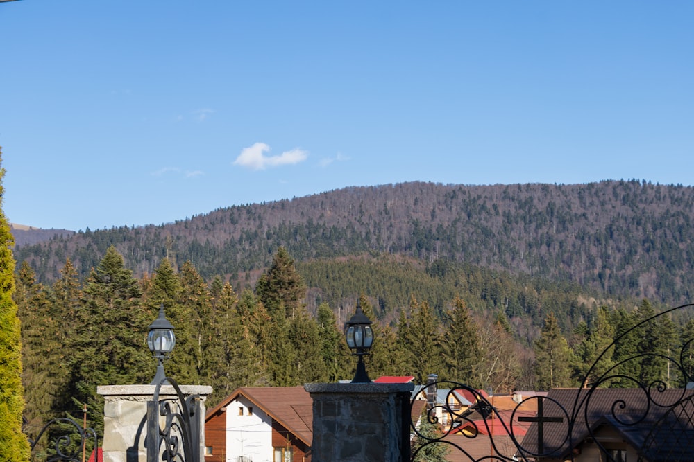 a view of a mountain with a house in the foreground