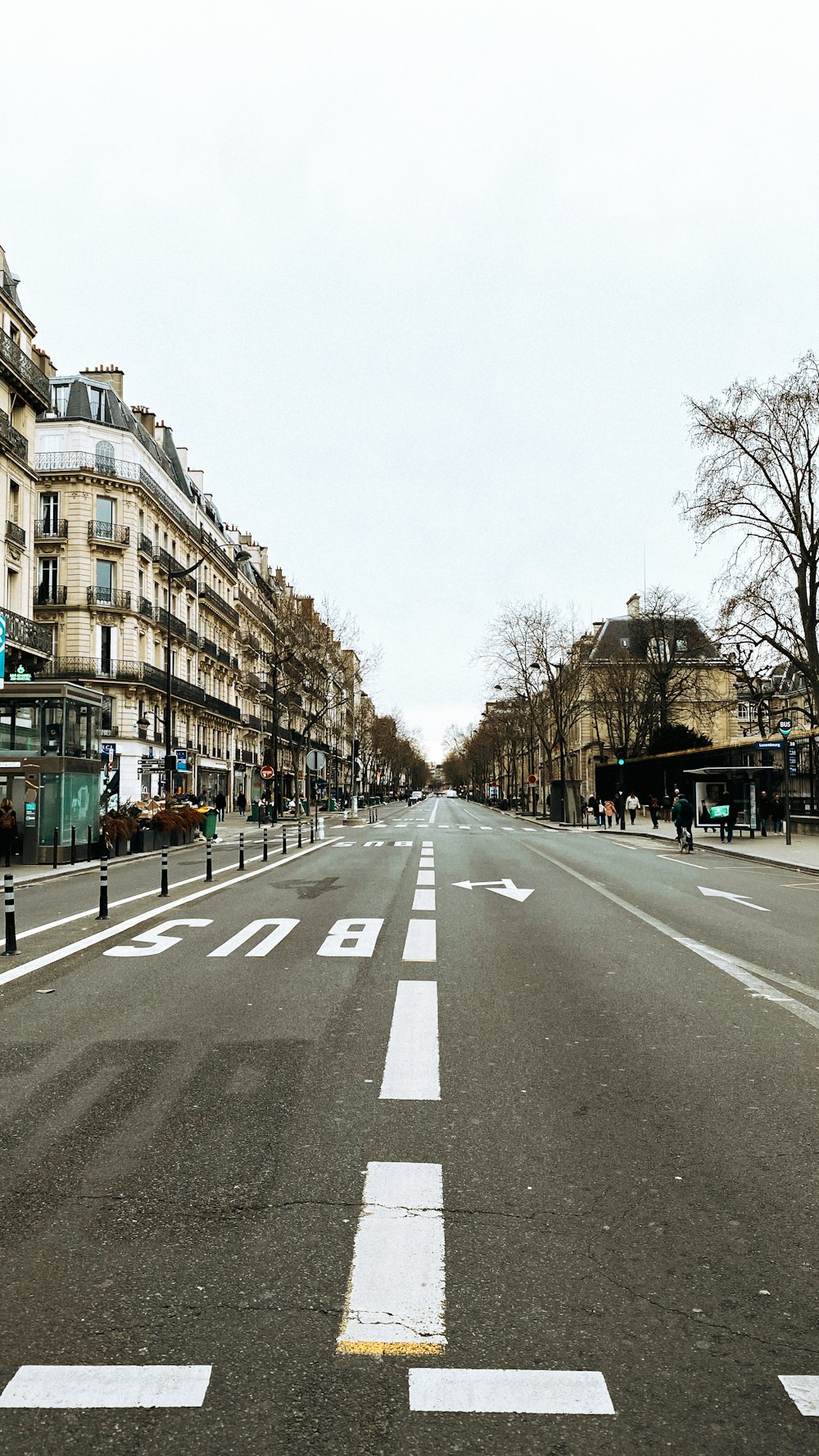 an empty street with buildings on both sides