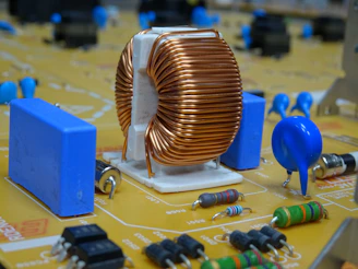 a close up of a circuit board with many electronic components