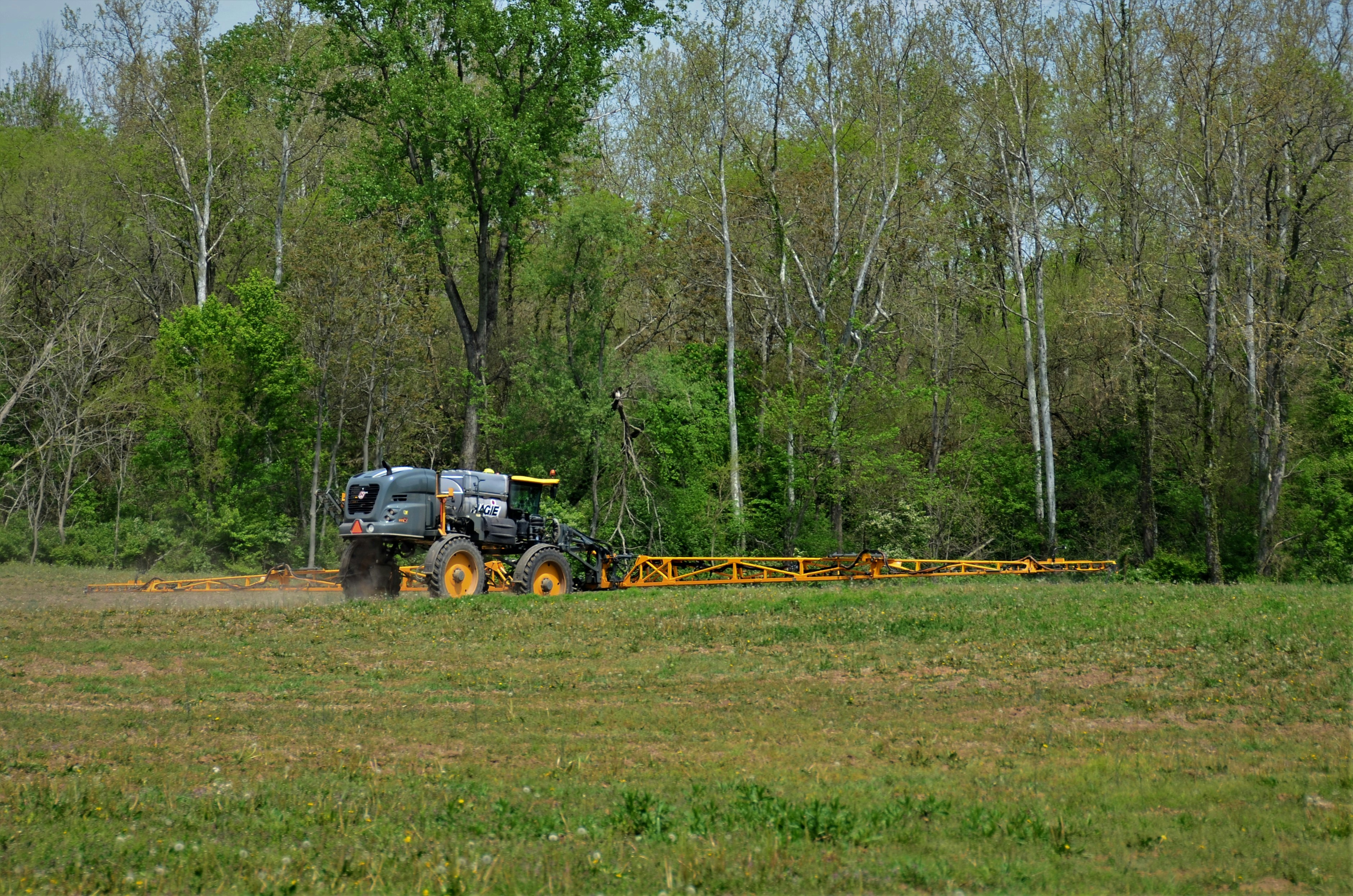 Farmer applying our fertilizer