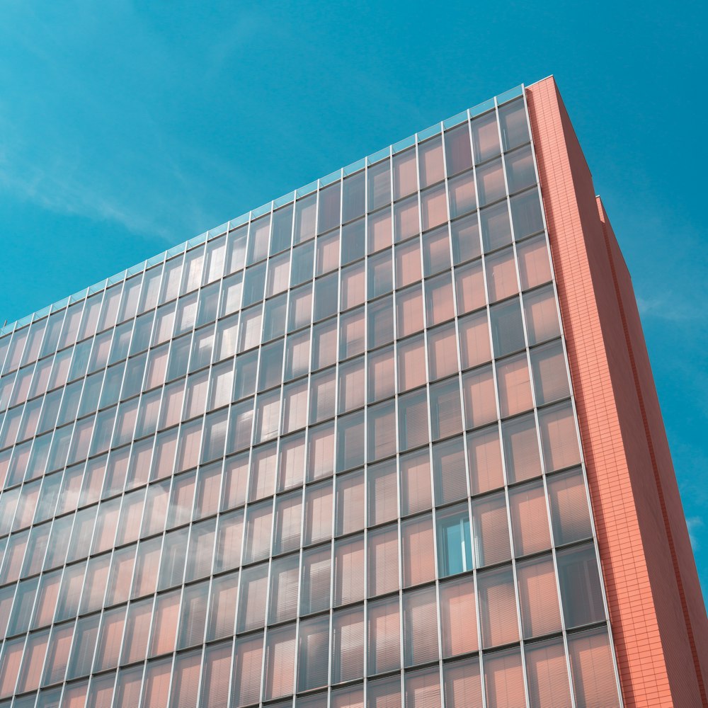 a tall building with a clock on the side of it