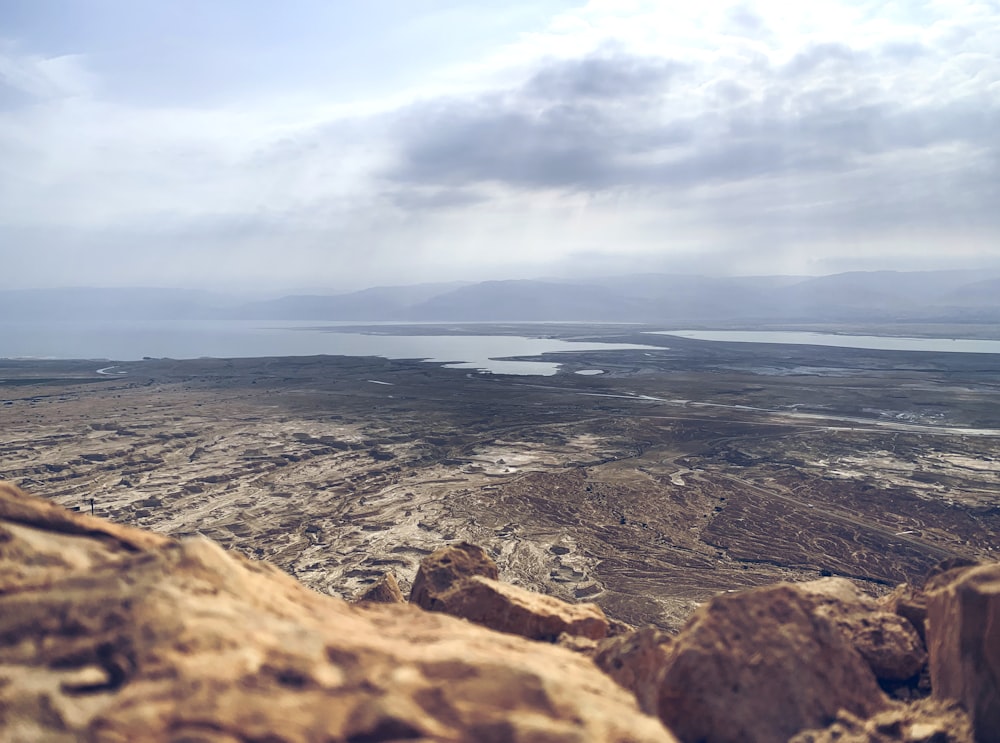 a view of a large body of water from a hill