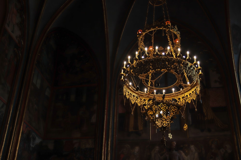 a chandelier hanging from the ceiling of a church