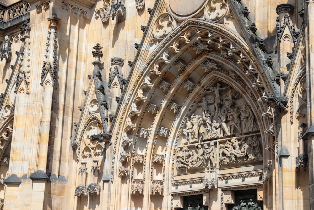 a large cathedral with a clock on the front of it