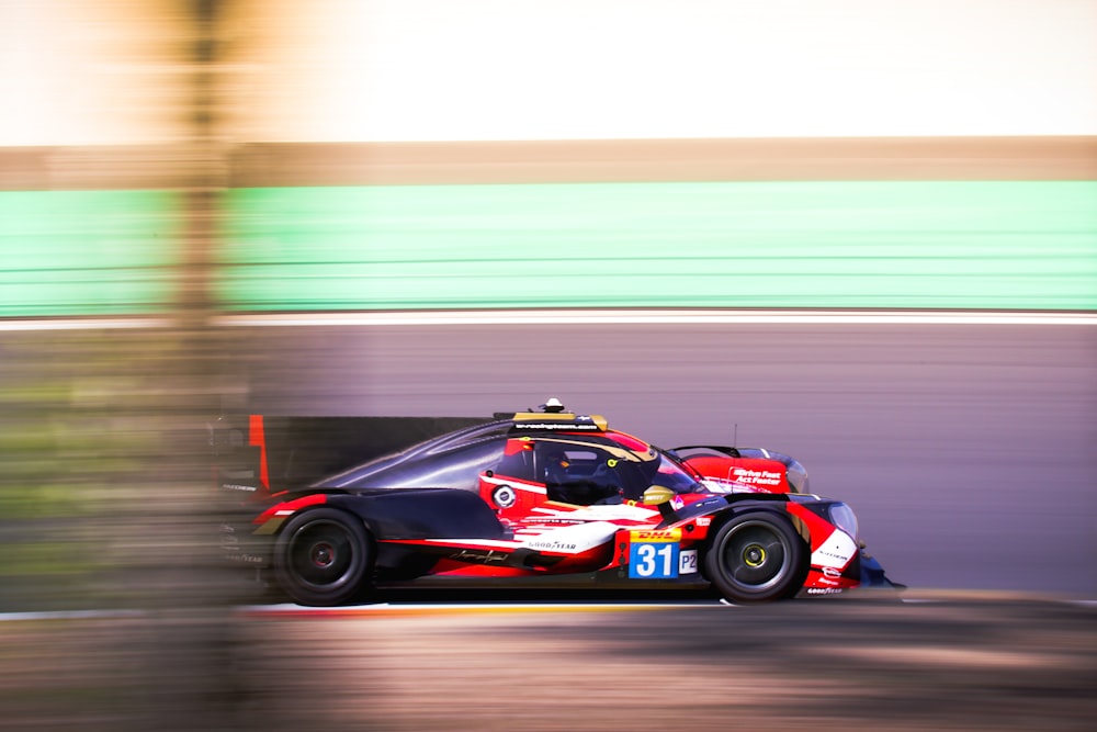 a racing car driving down a race track