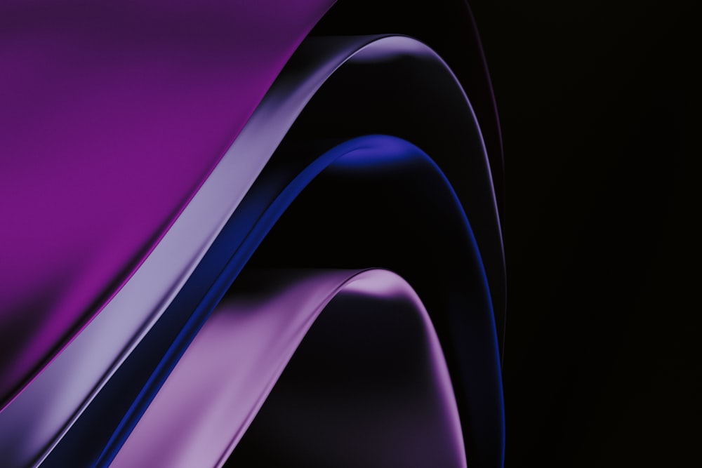 a close up of a purple and black background