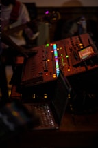 a control panel sitting on top of a wooden table