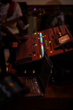 a control panel sitting on top of a wooden table
