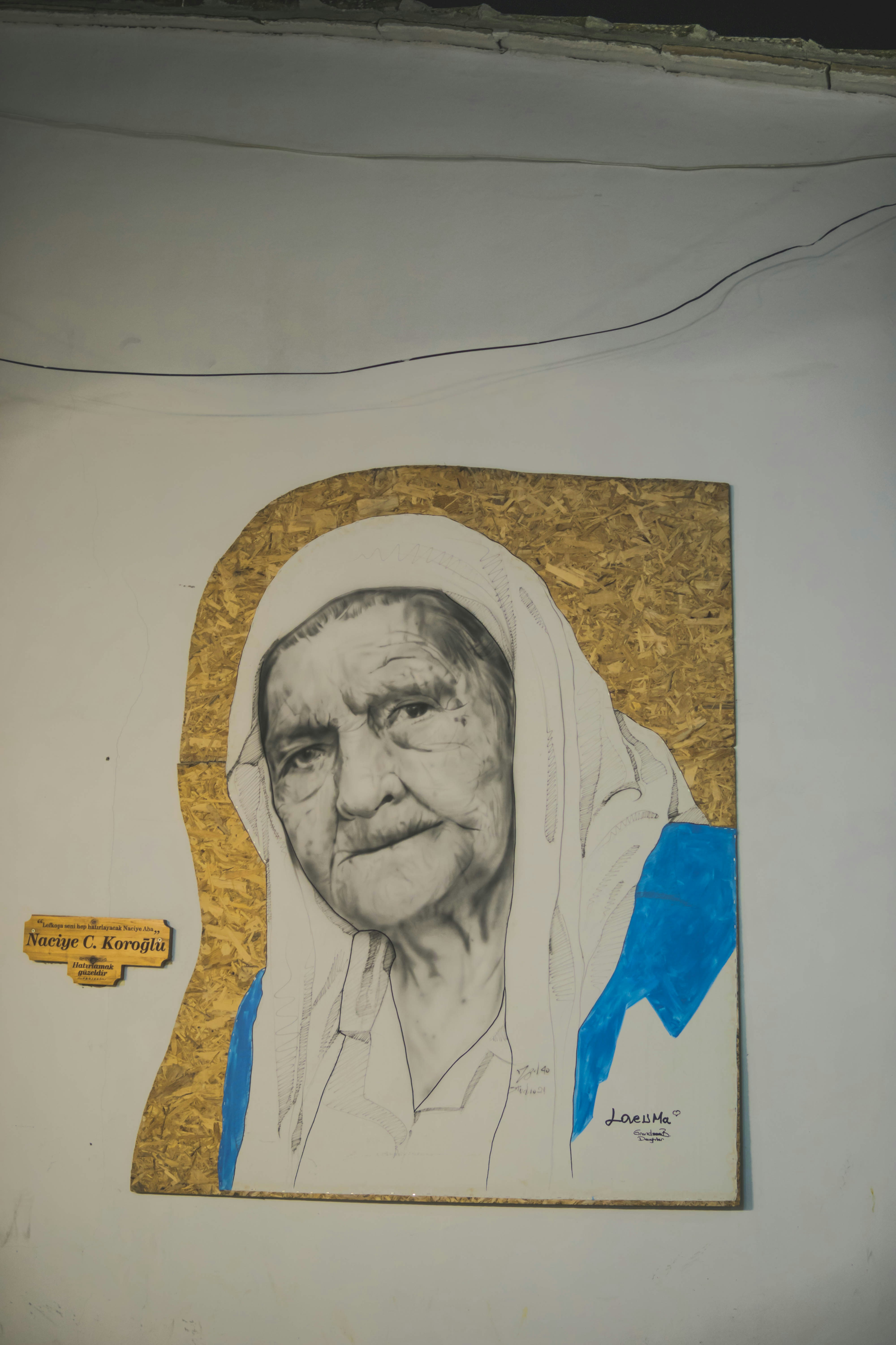 Detailed charcoal portrait study of an elderly South African woman