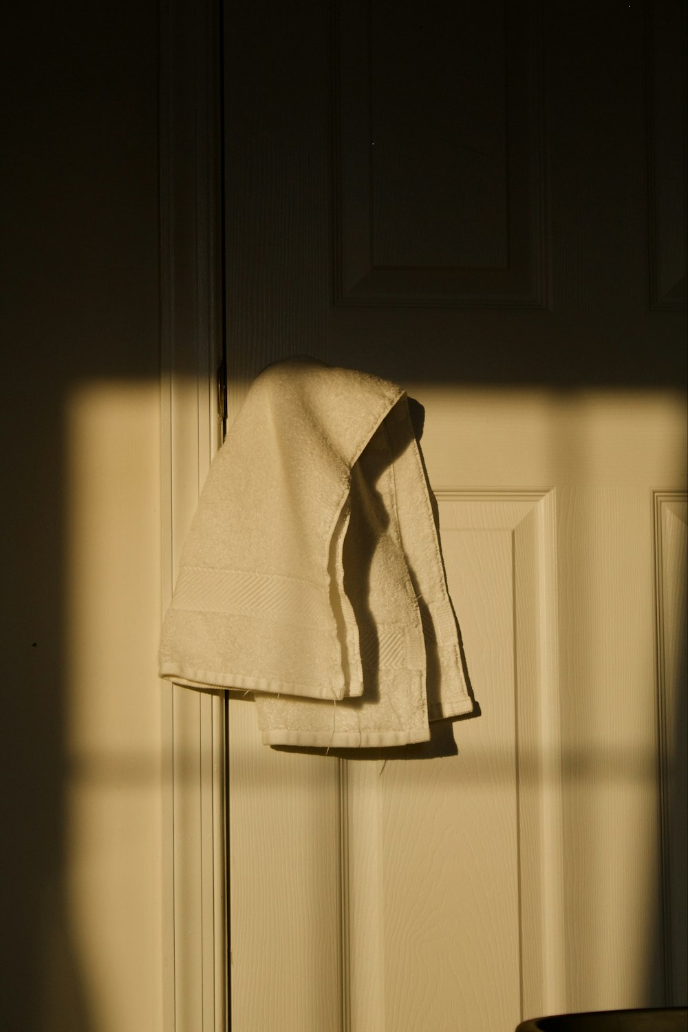 a towel is hanging on a door handle