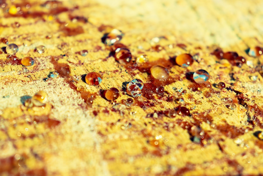 a close up of water droplets on a surface