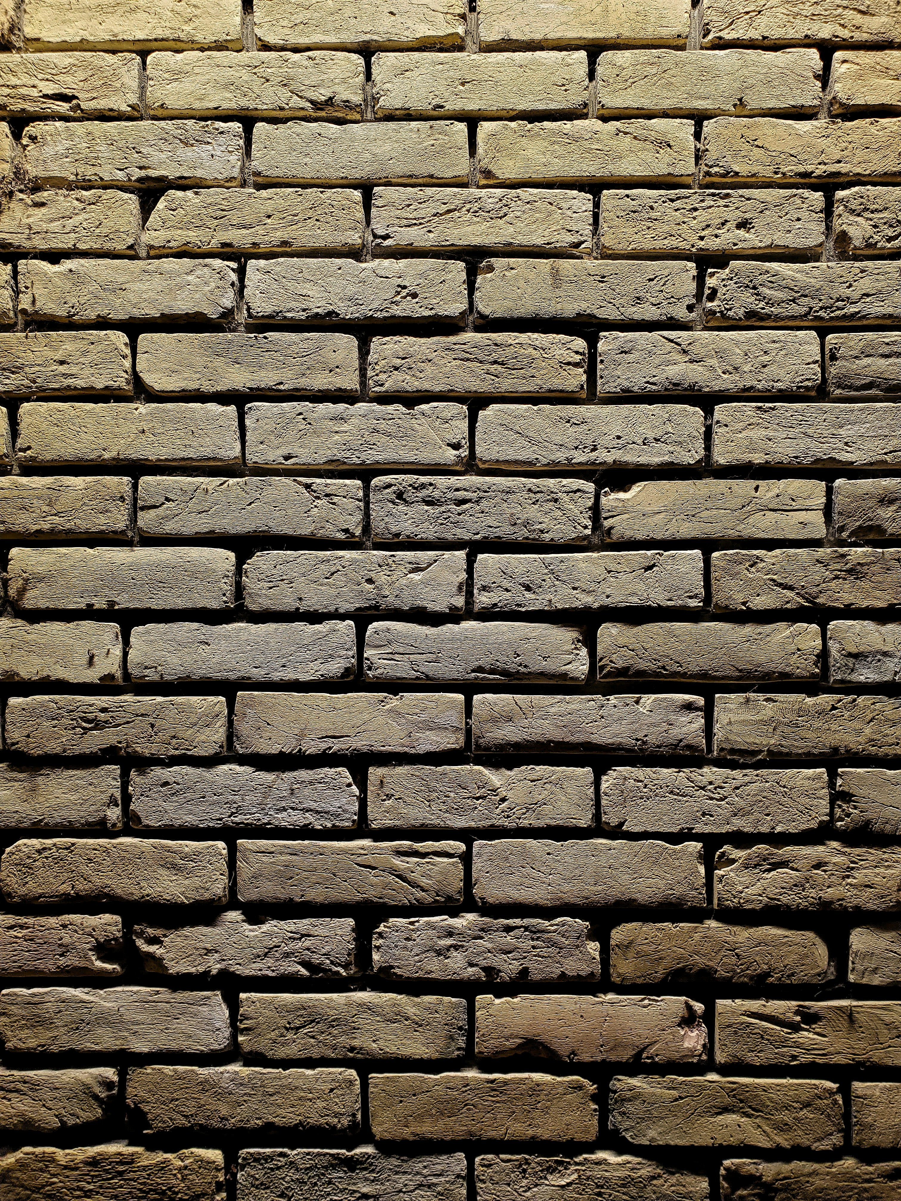 A close up of a brick wall made of bricks photo Free Ukraine Image on