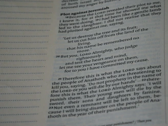 Minimalist flat lay of a printed page from the free preview PDF, featuring serif typography