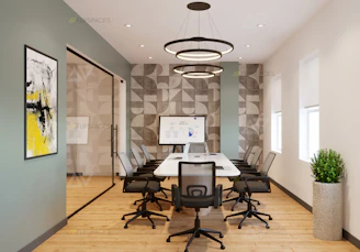 A modern conference room with acoustic art on the walls.