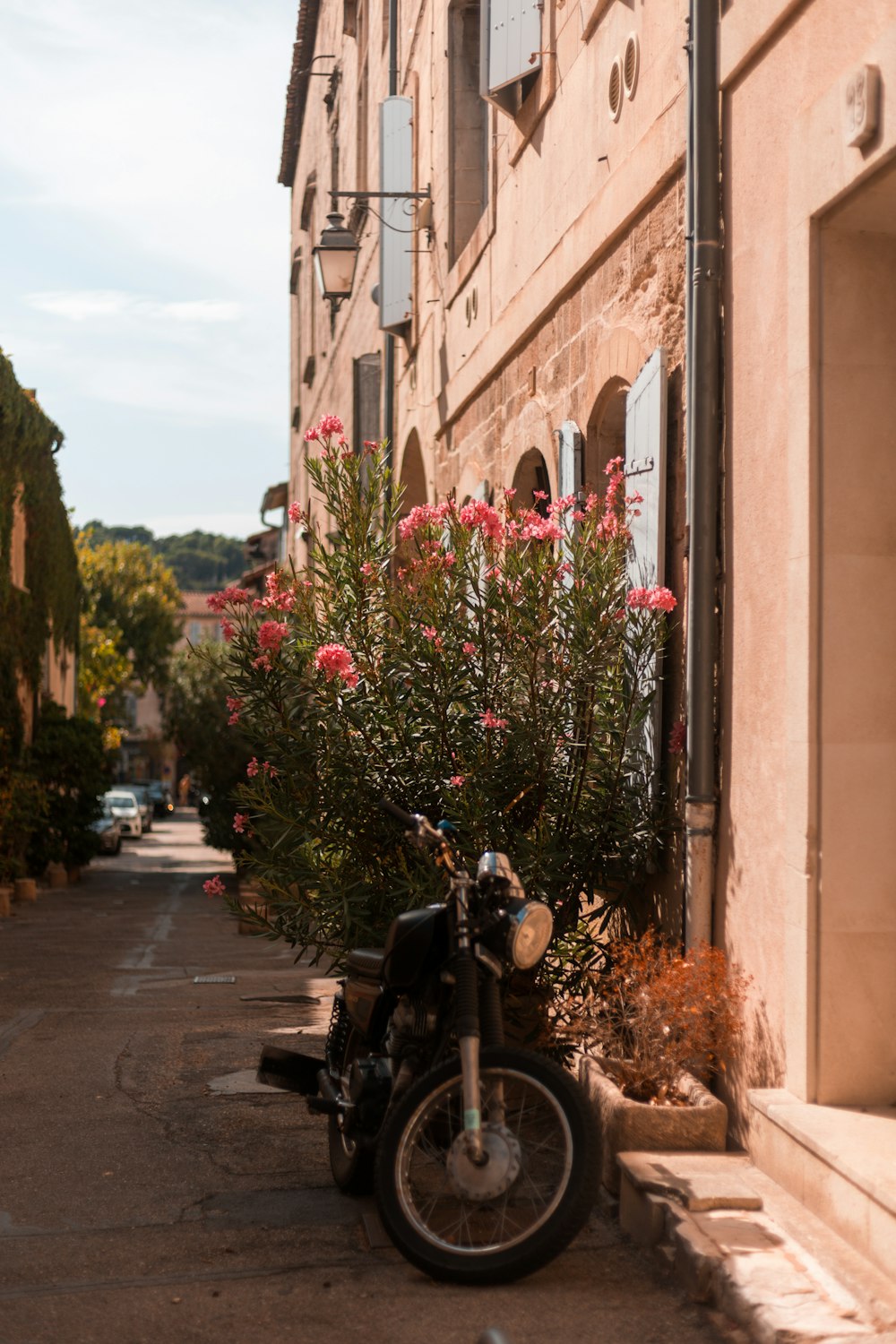 a motorcycle parked on the side of a street