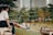 A group of stylish friends enjoying a day out in a vibrant park.