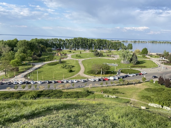 A scenic view of Lakepines community park with families enjoying the outdoors.