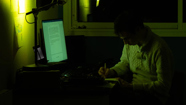A focused writer crafting compelling campaign messages at a desk.