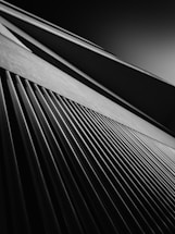 Abstract architectural lines in muted tones suggesting connection and structure.