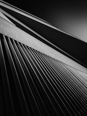 Abstract architectural lines in muted tones suggesting connection and structure.