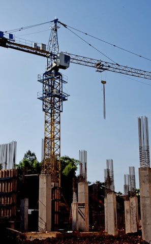 a construction site with a crane in the background