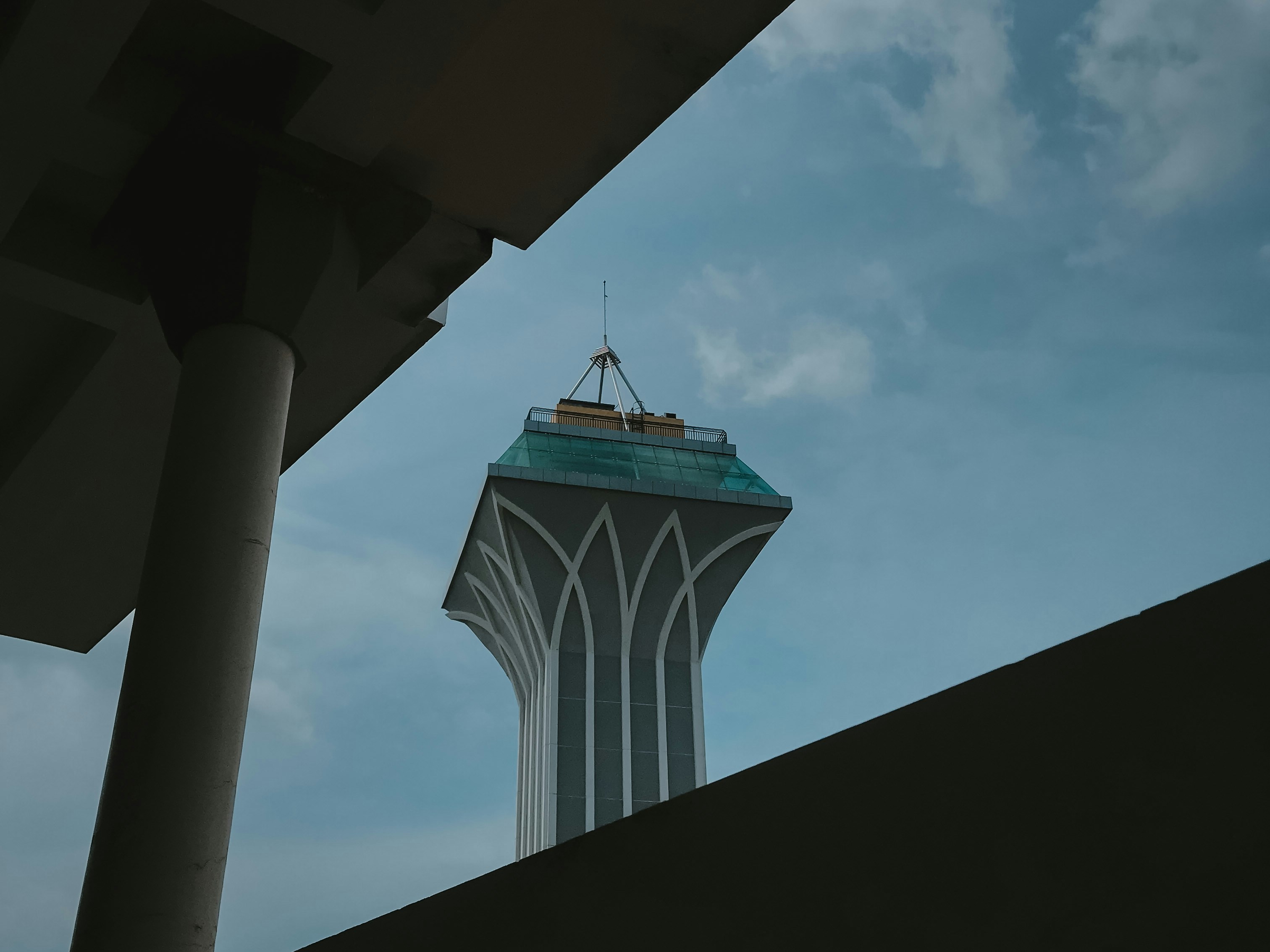 a tall tower with a sky background