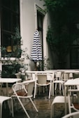 A beautiful outdoor patio with clean surfaces and greenery.
