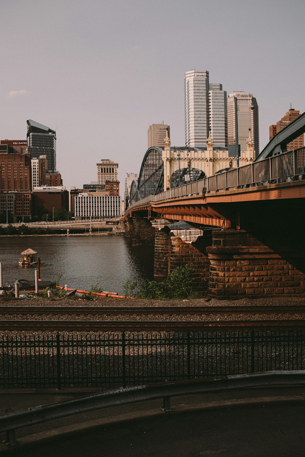 a train traveling over a bridge over a river