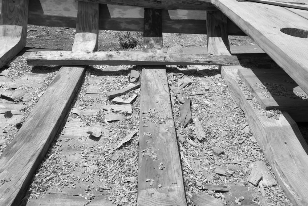 a black and white photo of a wooden boat