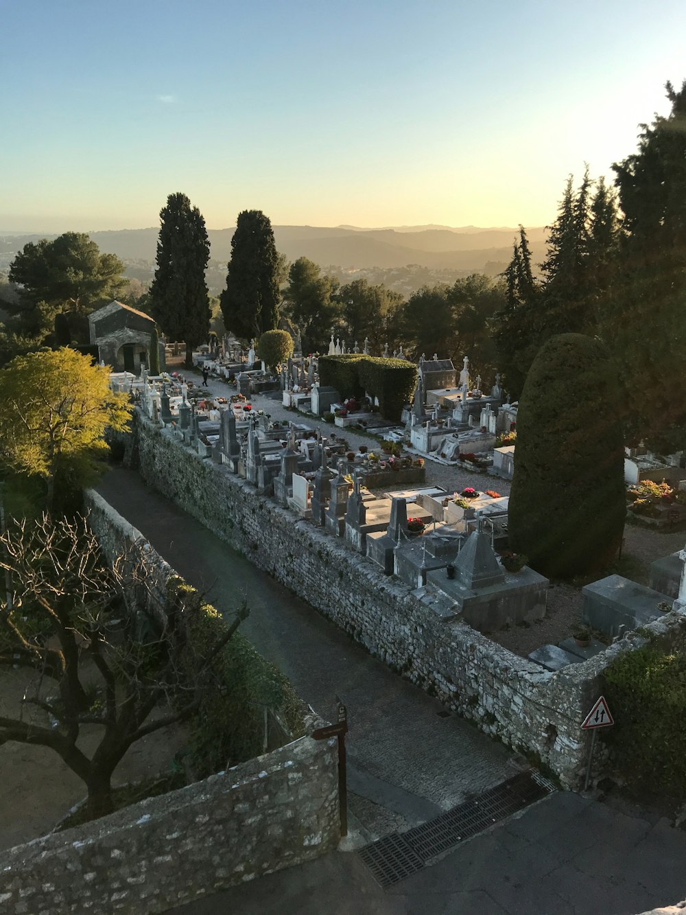 a cemetery with a river running through it