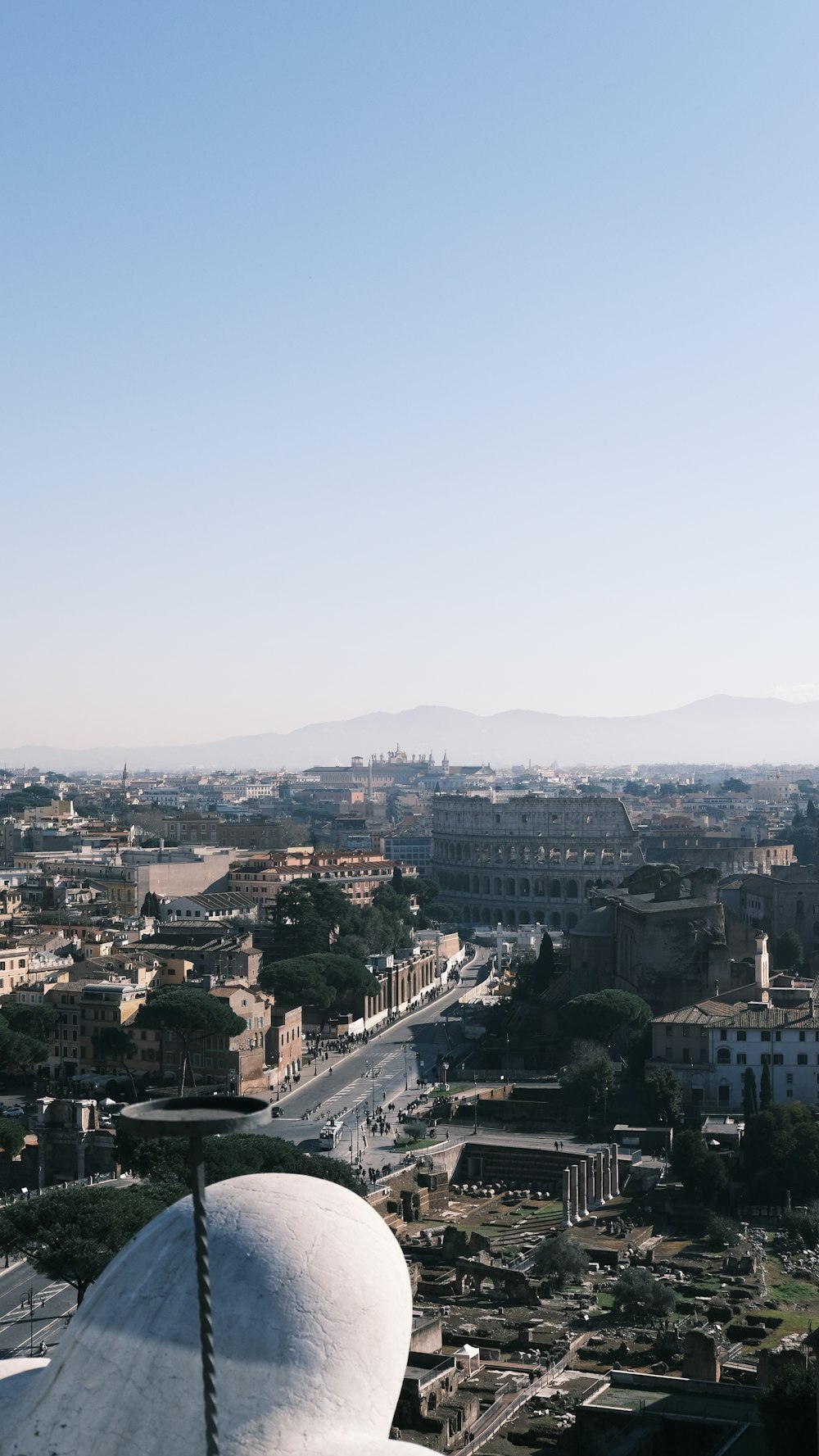 a view of a city from the top of a building